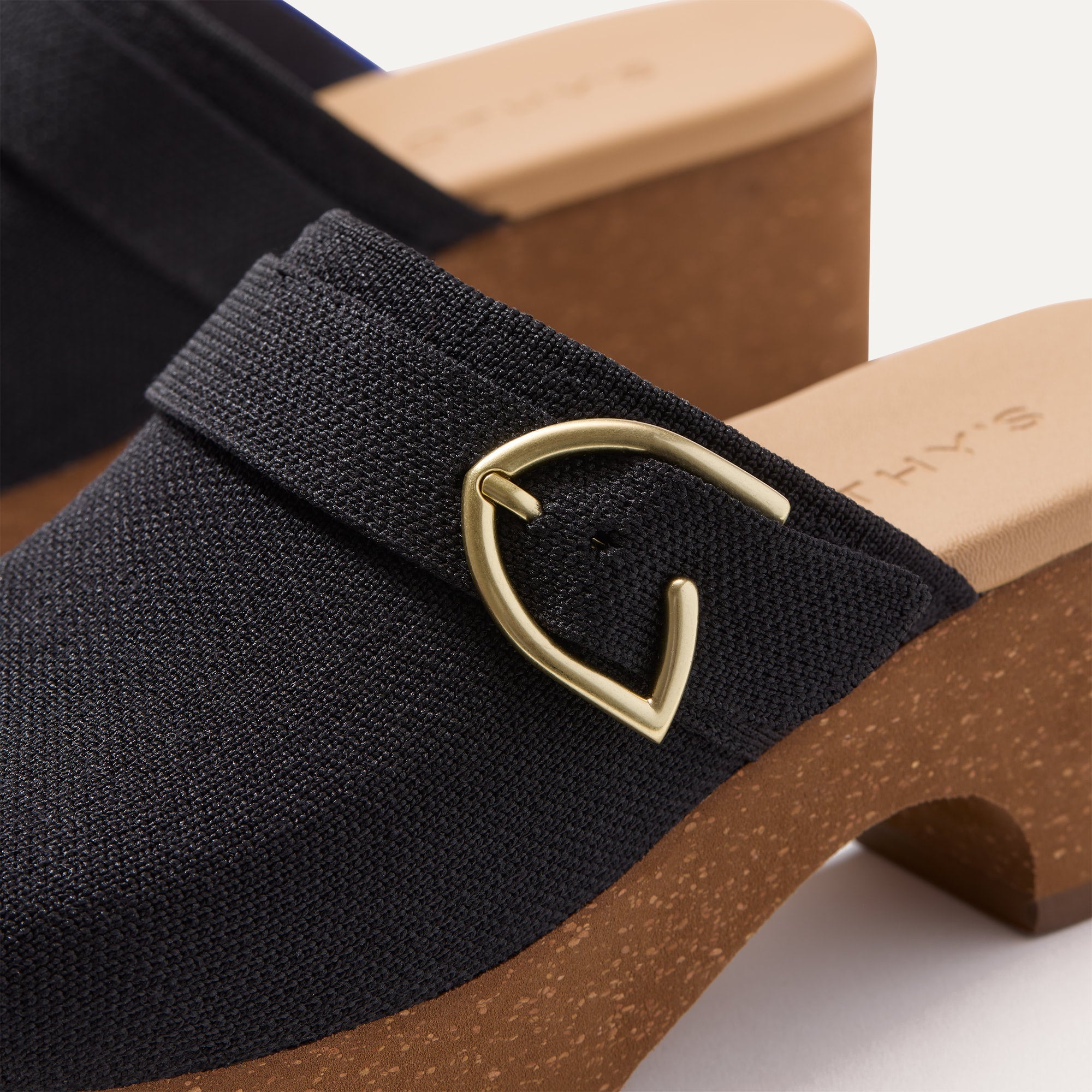 Close up of the buckle on The Classic Clog in Black.
