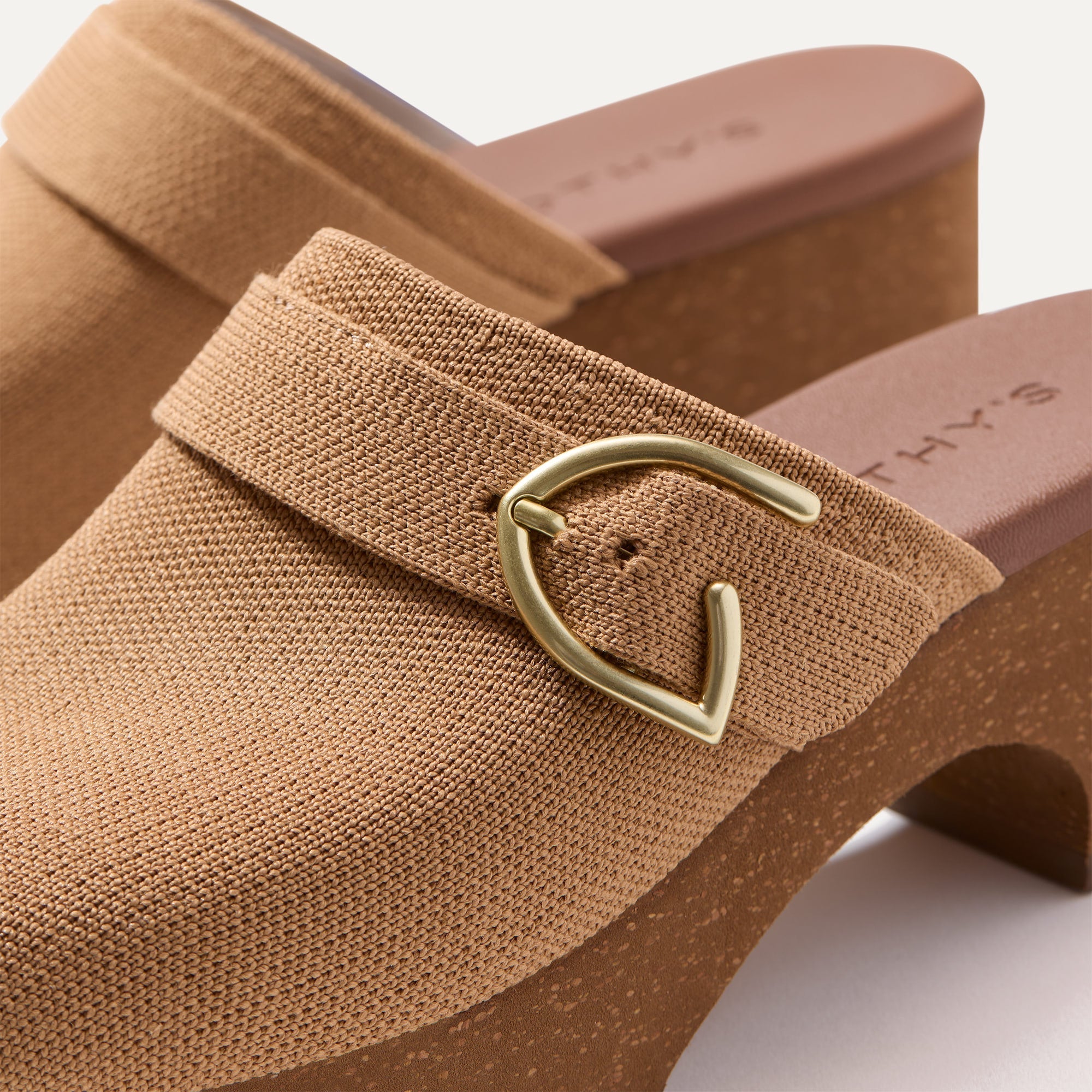 Close up of the buckle on The Classic Clog in Butternut.