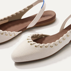 Close up of the toe and vamp on The Almond Slingback in Eyelet Ivory.