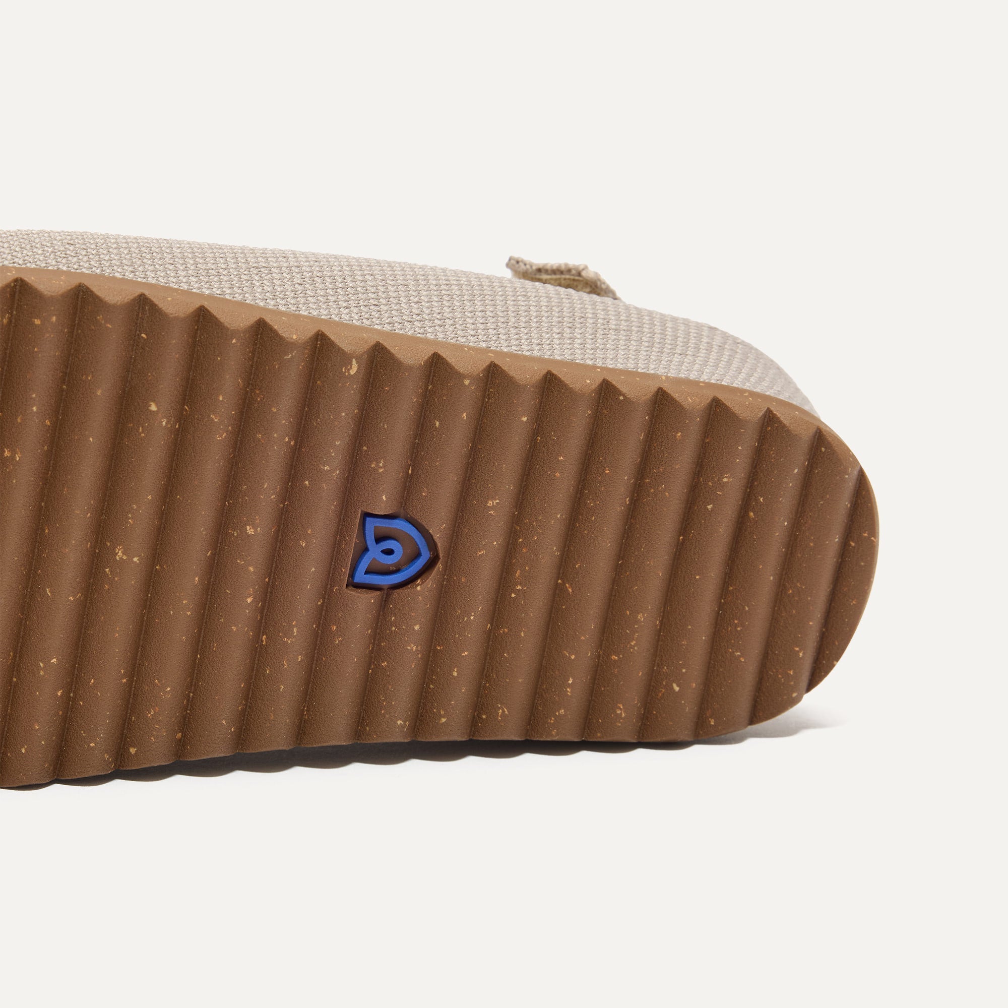 The sole of The Kids Clog in Dove.